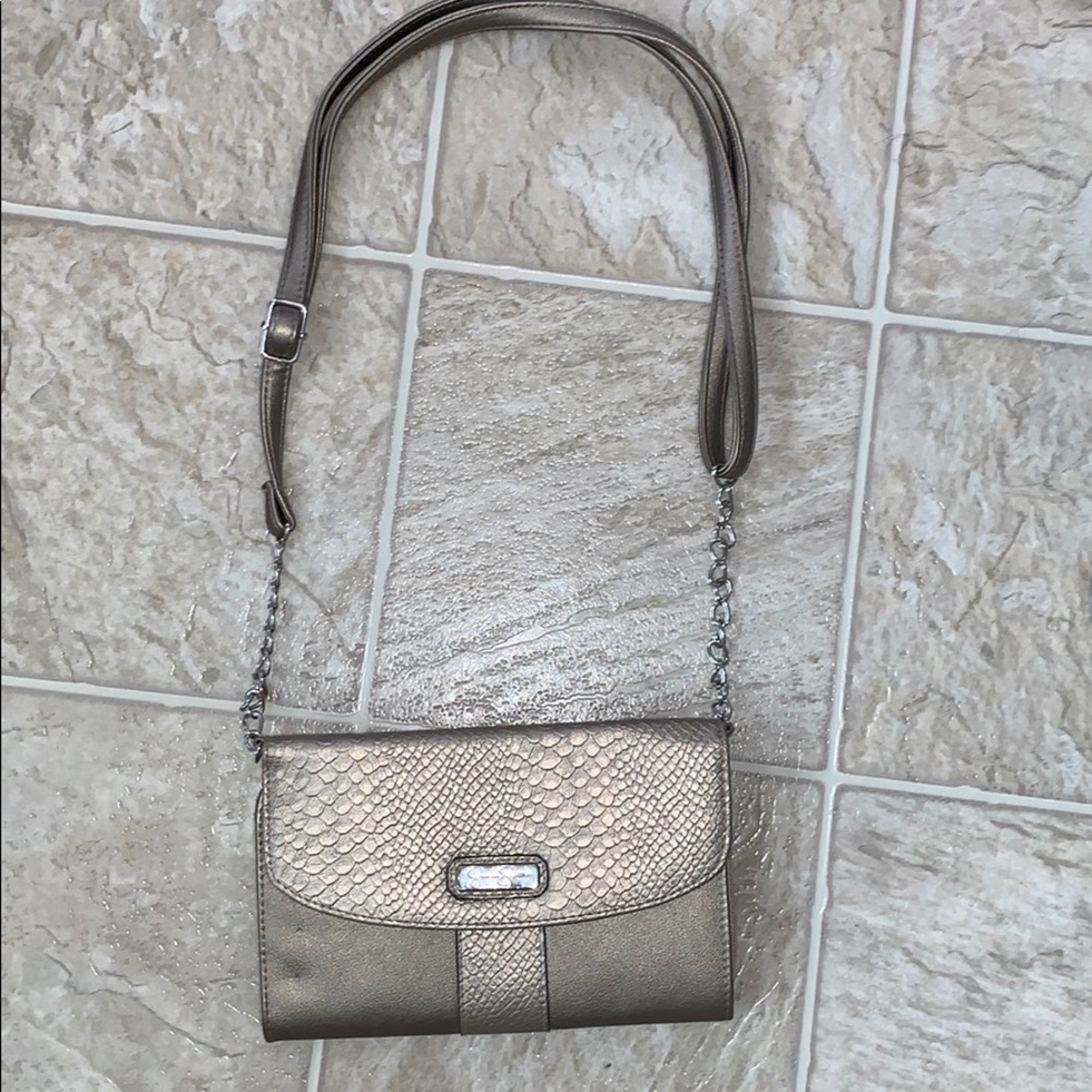 Jessica Simpson over the shoulder purse